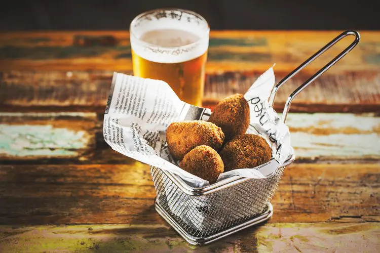 Croquettes served with a cold beer.