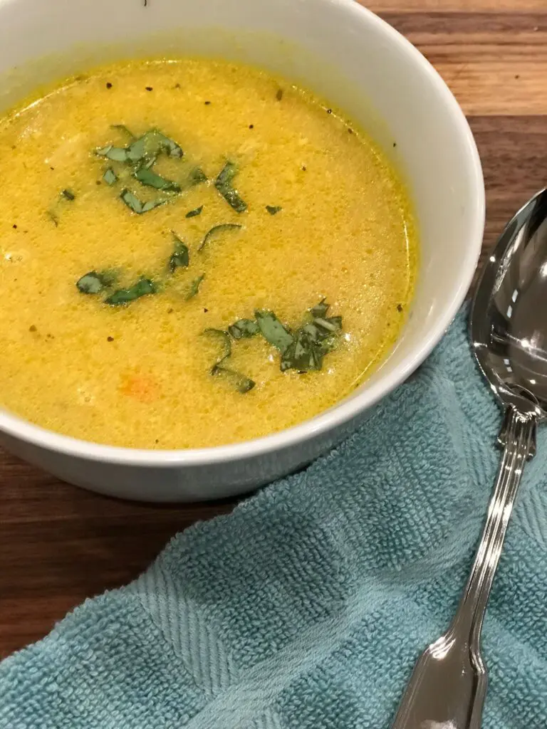 A steaming bowl of chicken soup