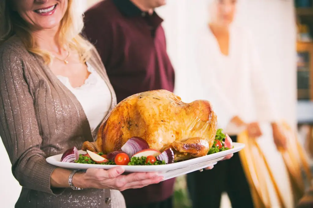 Jorj revealing the golden roasted turkey fresh out of the oven