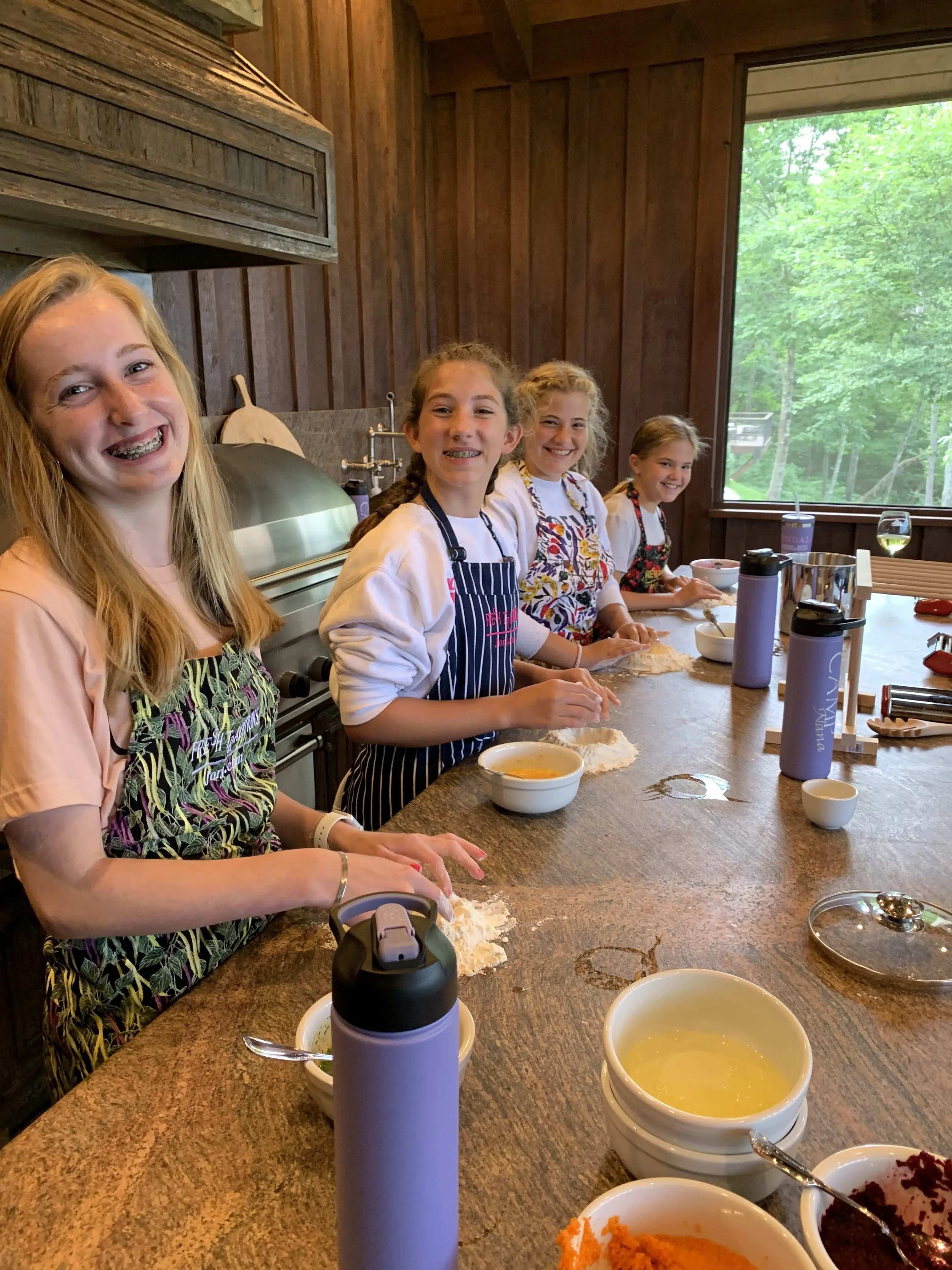 Original photo of Camp Nana campers laying out colorful pasta