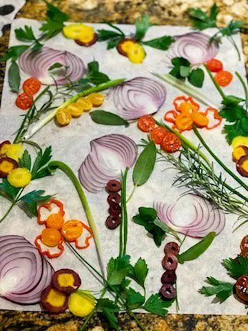 A beautiful garden art design on fresh focaccia bread