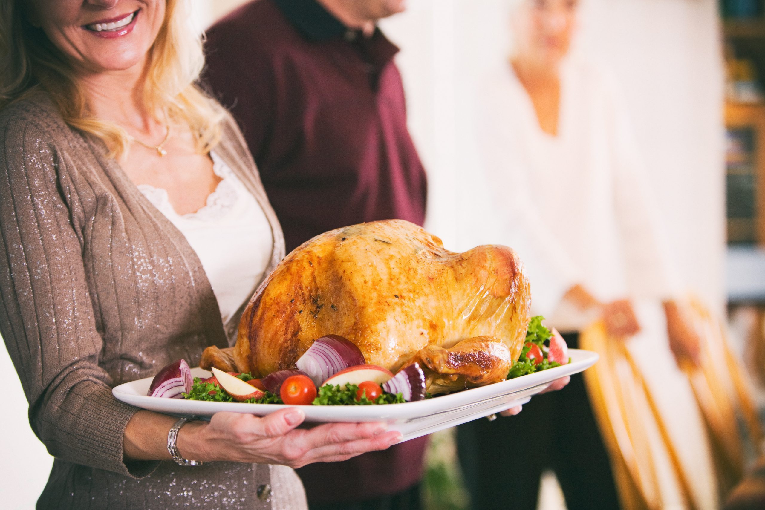 The glorious golden roasted turkey reveal straight out of the hot oven.