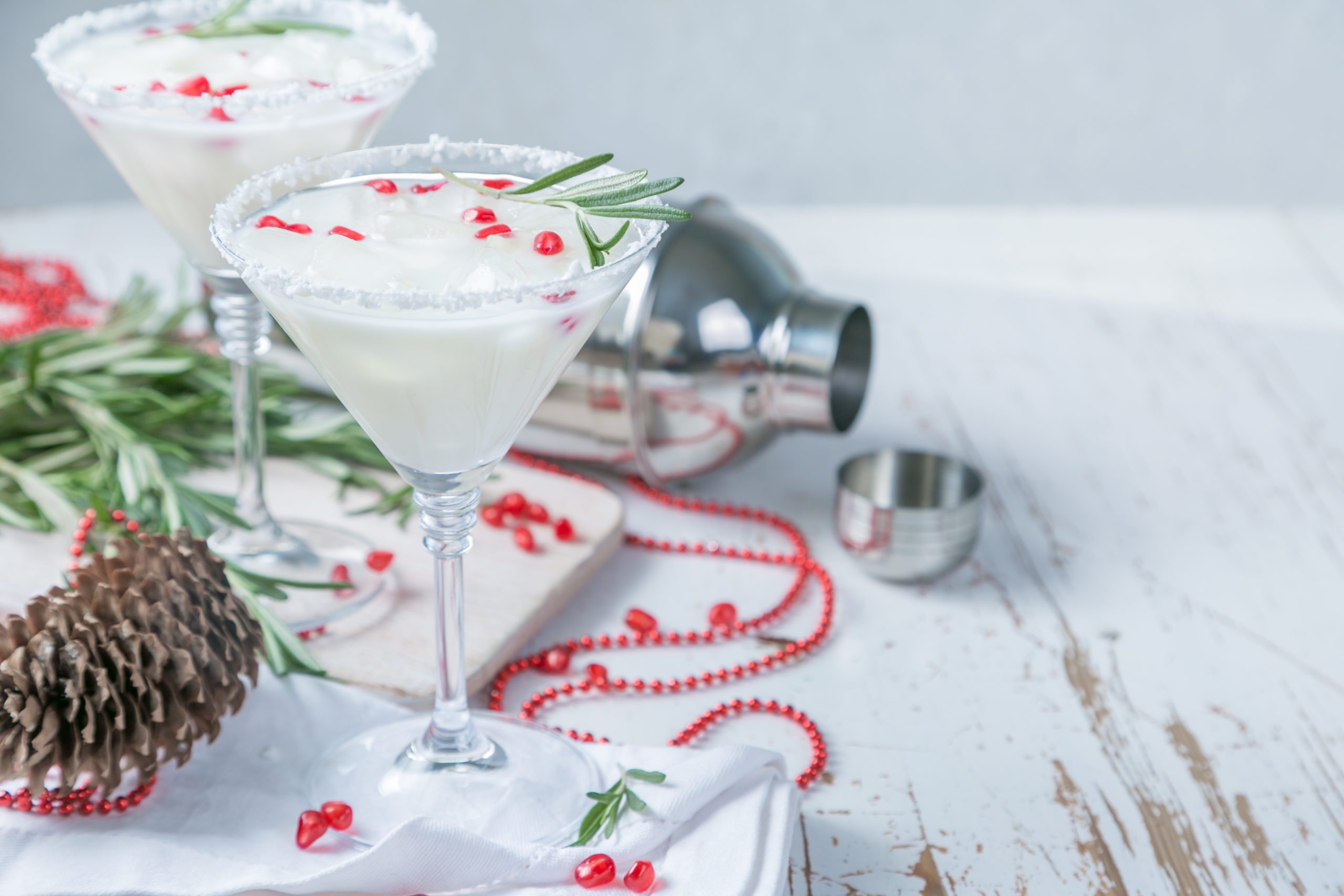 Christmas white margarita punch with rosemary and pomegranate