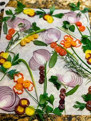 A beautiful garden art design on fresh focaccia bread